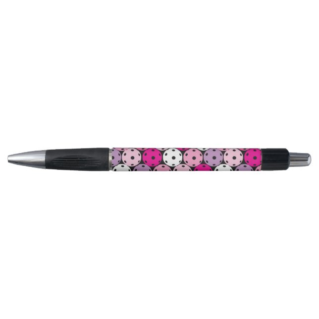 Pink, white and purple pickleballs,  pen (Front)