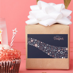 Pink white snowflakes in blue bakcground sticker