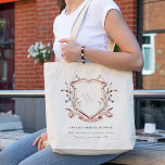 Pink Wildflower Watercolor Crest Bridal Shower Tote Bag<br><div class="desc">Pastel Wildflower watercolor Collection- it's an elegant watercolor Illustration of pink blush watercolor delicate wildflowers with a modern minimal touch. Perfect for your modern floral wedding & parties. It’s very easy to customize,  with your personal details. If you need any other matching product or customization,  kindly message via Zazzle.</div>