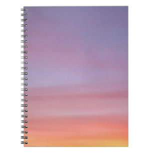 Pink, yellow, and purple cloudy sky notebook