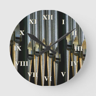Pipe organ clock with roman numerals