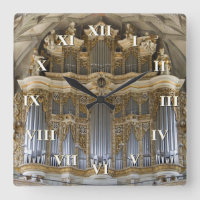 Pipe organ clock with roman numerals