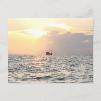 Pirate ship in Sunset Postcard