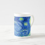PixDezines van gogh starry night/st. remy Bone China Mug<br><div class="desc">Van Gogh's famous painting,  "The Starry Night." Painted during his stay at the Saint Remy asylum in the 1880's,  van Gogh depicted the rolling hills and cypress trees he saw from his window.  Digitally enhanced by PixDezines.  Copyright © 2008-2016 PixDezines.com™ and PixDezines™ on zazzle.com. All rights reserved.</div>