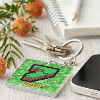 Pixelated Gamer Green Building Level Up 7 Keychain