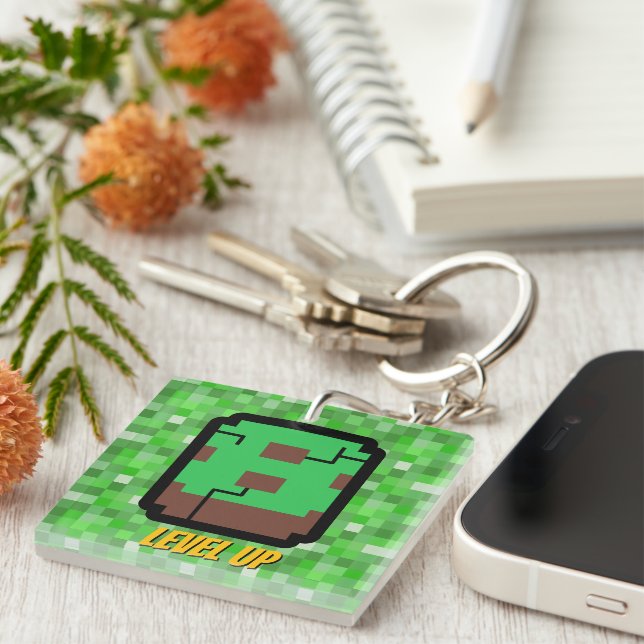 Pixelated Gamer Green Building Level Up 8 Keychain (Front Right)