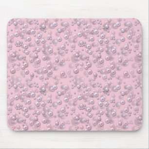 Placers of white-pink pearls on pink velvet mouse pad
