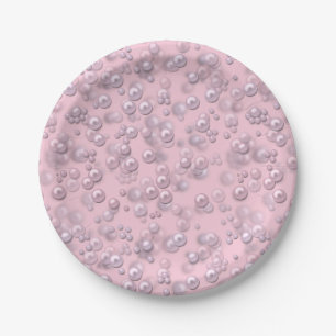 Placers of white-pink pearls on pink velvet paper plate