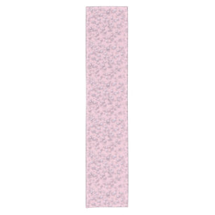 Placers of white-pink pearls on pink velvet short table runner