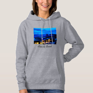 Plage de canon au sweat - shirt à capuche bleu