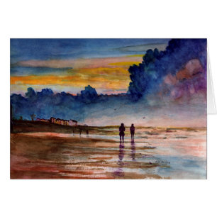 Plage orageuse de coucher du soleil peignant le