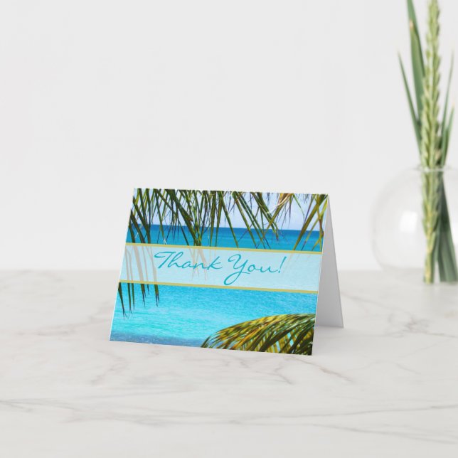 Plage tropicale et paumes épousant le Merci (Devant)