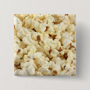 Plain popcorn close up. 2 inch square button