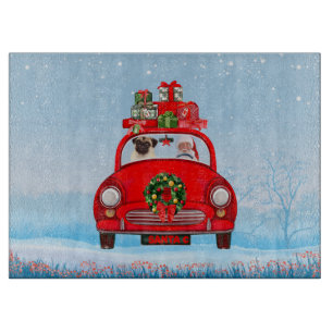Planche À Découper Chien Carlin dans une voiture avec le Père Noël