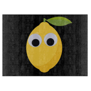 Planche À Découper Citron, fruit sucré avec des yeux globuleux