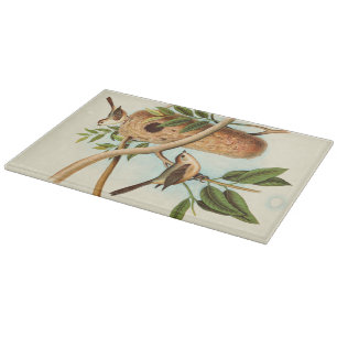 Planche À Découper Couple d'oiseaux sur un nid perché sur une branche