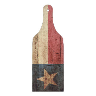 Planche À Découper Drapeau d'état du Texas sur le vieux grain en bois