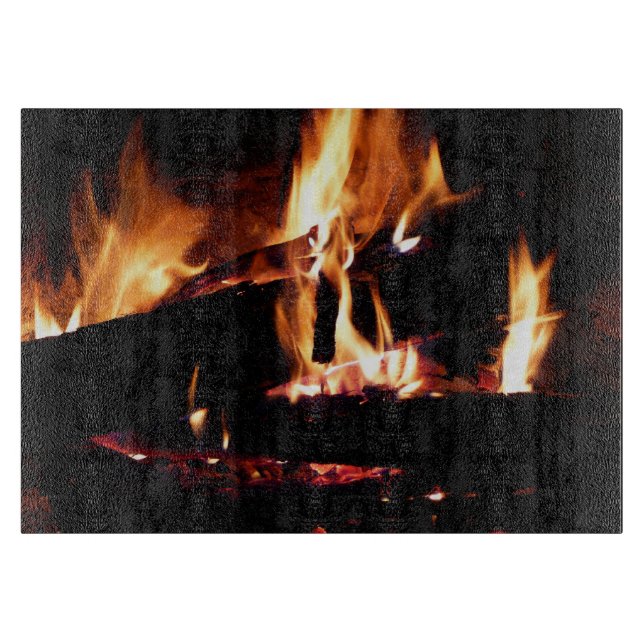 Planche À Découper Logs dans la cheminée Photographie de feu chaud (Devant)