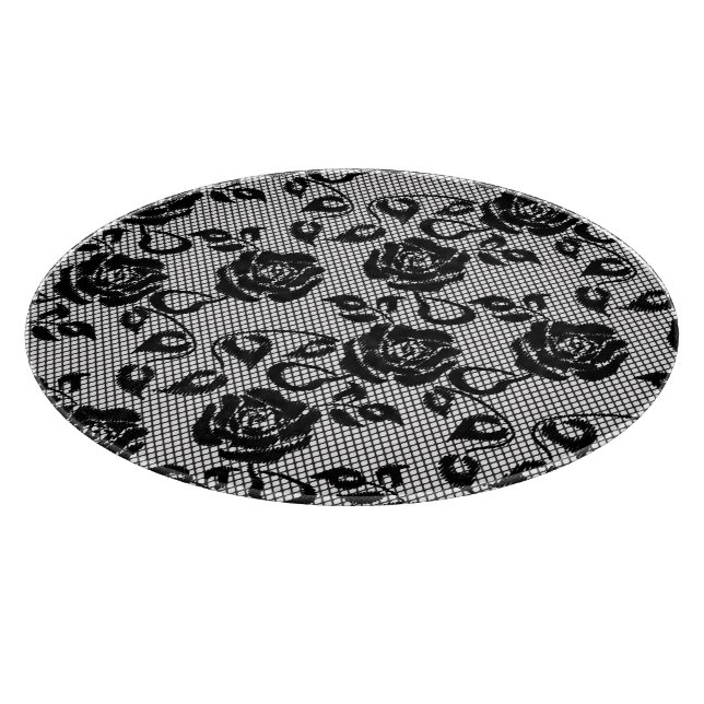 Planche À Découper motif en dentelle noire sur arrière - plan blanc (Coin)