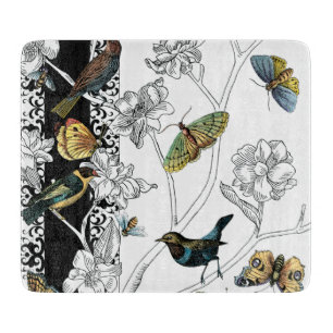 Planche À Découper Oiseaux et papillons sur un Arrière - plan noir et
