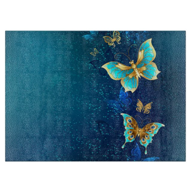 Planche À Découper Papillons d'or sur un Arrière - plan bleu (Devant)