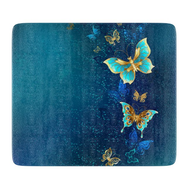 Planche À Découper Papillons d'or sur un Arrière - plan bleu (Devant)