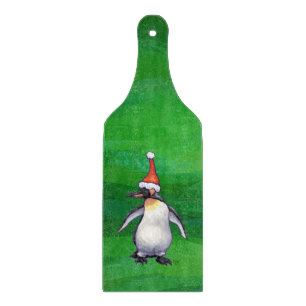 Planche À Découper Pingouin mignon à Santa Hat sur Vert