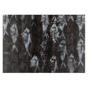 Planche À Découper Poissons blancs fossiles sur l'arrière - plan noi