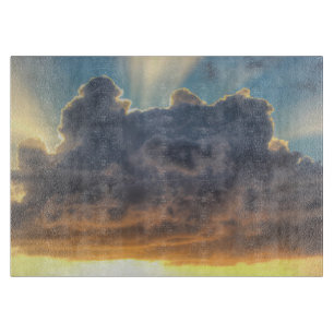 Planche À Découper Rayons de soleil à travers les nuages orageux