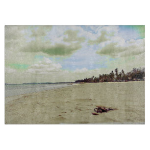 Planche À Découper Sandales sur la plage tropicale