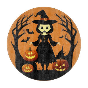 Planche À Découper Sorcière d'Halloween avec citrouilles dans un cadr