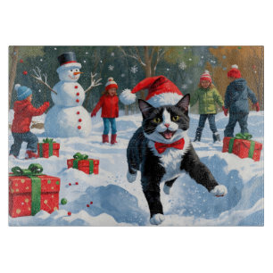 Planche À Découper Tuxedo Chat coule en neige avec Casquette de Noël