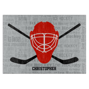 Planche À Découper Typographie rouge de casque et de bâtons de hockey