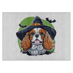 Planche À Découper Un chien portant un chapeau de sorcière avec des c
