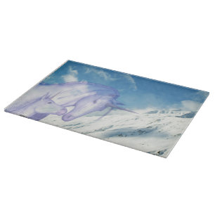 Planche À Découper Unicorn Maman et son bébé sur la montagne neigeuse