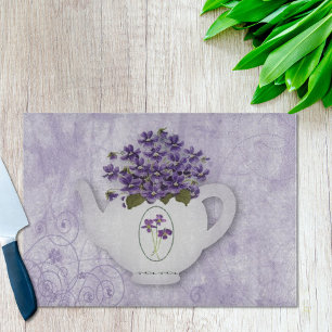 Planche À Découper Violettes Dans Une Théière