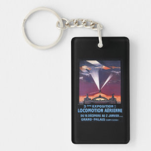 Plane Flying Over Searchlight Poster Keychain