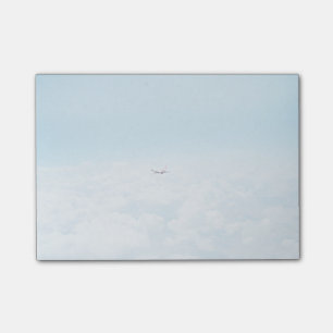 Plane Themed, A Airplane Flies In Blue Skies Above Post-it Notes