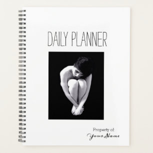 Planificateur quotidien - Femme tenant les pieds -