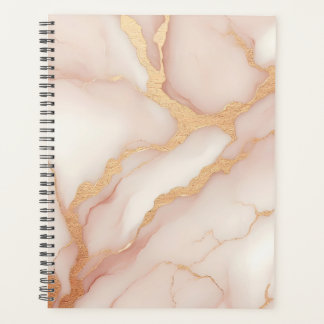 Planner en marbre rose vif avec veines or