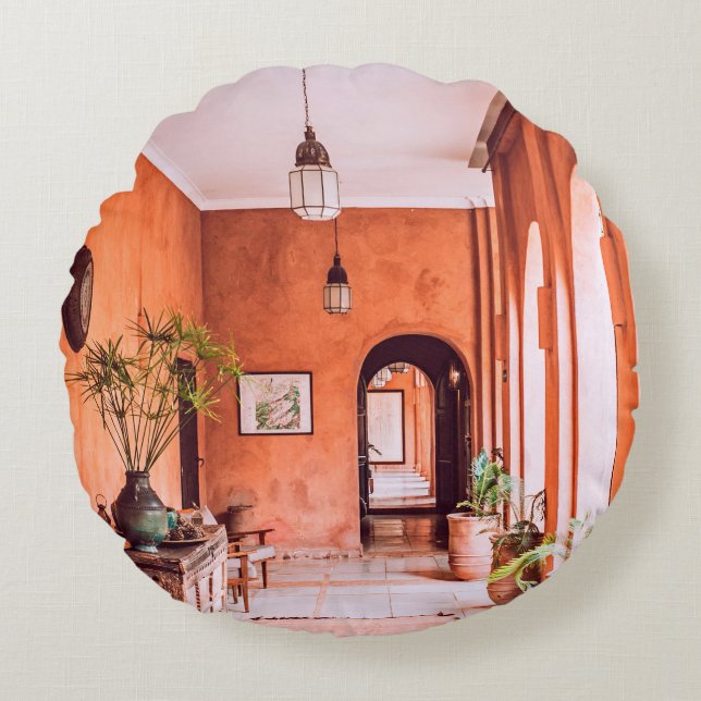 PLANTERS WITH PLANT NEAR AREA RUG INSIDE ROOM ROUND PILLOW (Front)