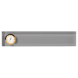 Plaque de bureau grise avec horloge