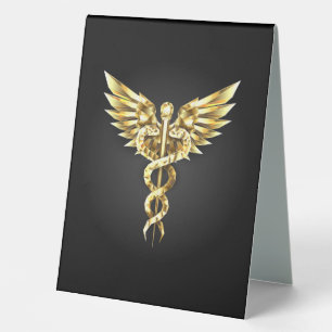 Plaque De Table Symbole caducee polygonale en or