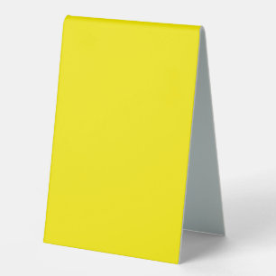 Plaque De Table un fond jaune avec une bordure noire