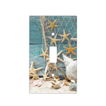 Filet nautique d'étoiles de mer et de pêcheur