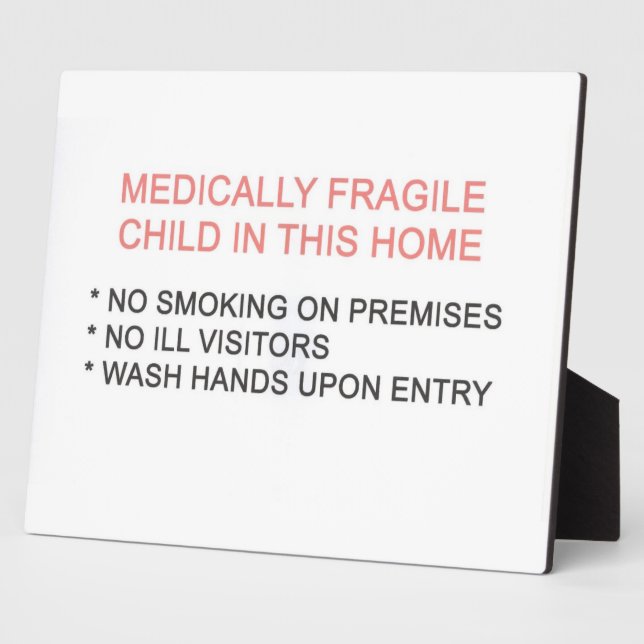 Plaque Photo Enfant fragile sur le plan médical à la maison Pla (Côté)