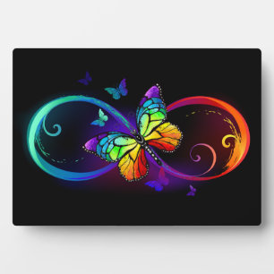 Plaque Photo Vibrant infinity with rainbow butterfly on black