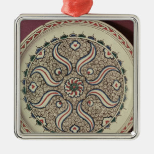 Plate decorated with a flame pattern metal ornament