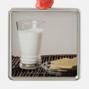 Plate of snacks with a glass of milk metal ornament