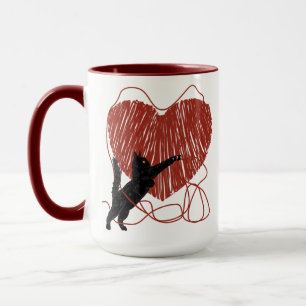 Playful Black Cat Unraveling Red Heart Mug